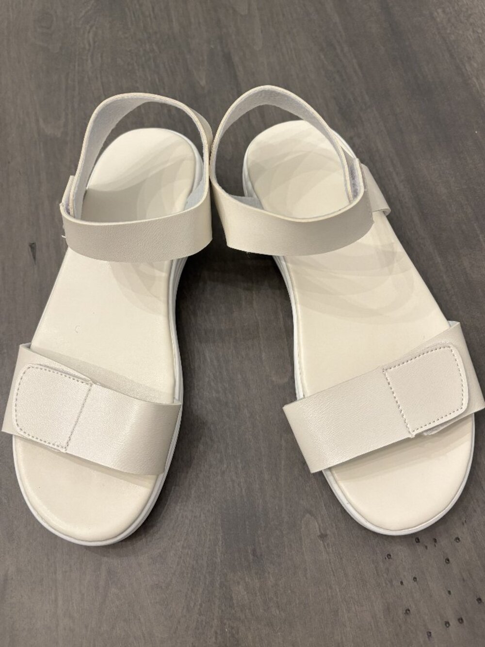 Women's white sandals.  Adjustable with hook and loop.  Size 7.5 NEW